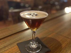 Experience River Falls Bars - Westwind Supper Club specialty drink on bar