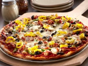 Experience River Falls Locally Loved - Carbone's pizza on pizza board