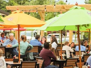 Experience River Falls Locally Loved - Juniors Patio