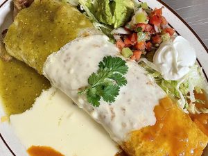 Experience River Falls Locally Loved - Close-up of enchilada at Mariachi Loco